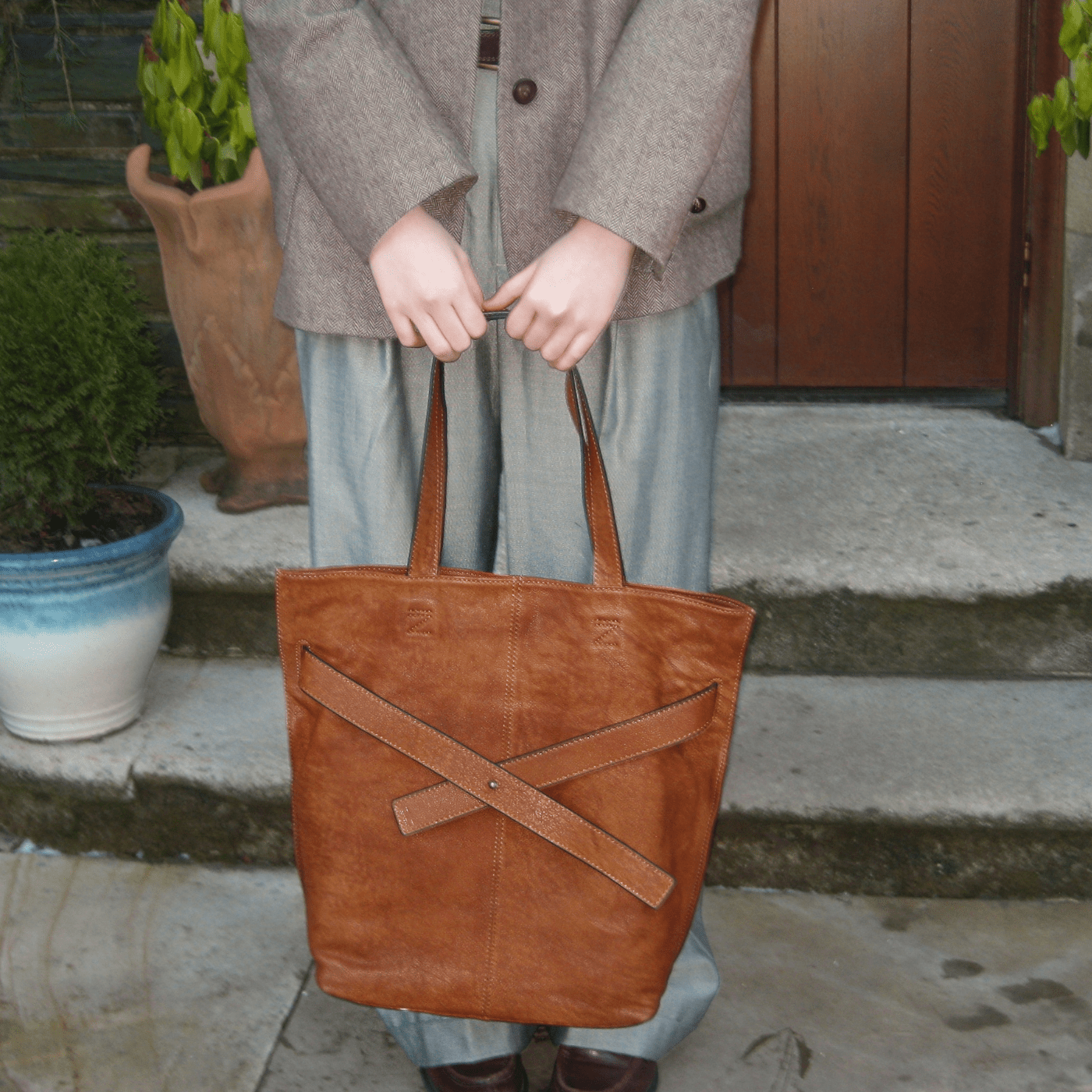 Soft Leather Tote with Unique Cross - Strap Design - Golden Crow